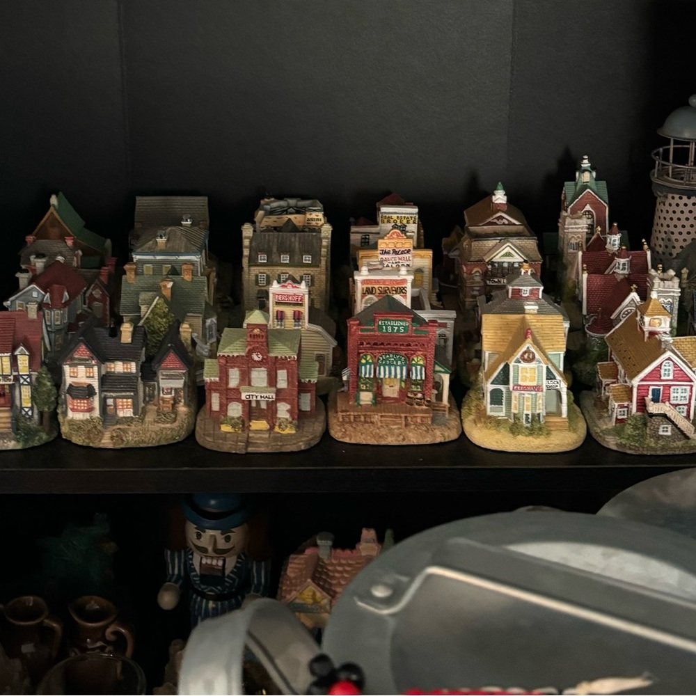 Village houses, churches & businesses. 27 prices & 1 lighthouse & animals